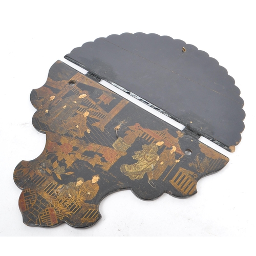 182 - A Japanese Oriental 19th century paper mache on ebonised wood folding wall shelf. The shelf having a... 