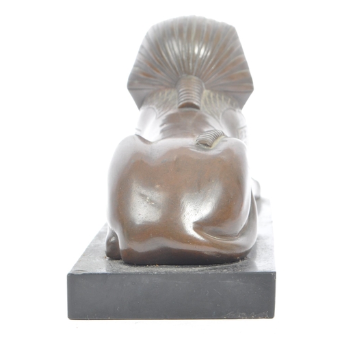 183 - An Egyptian Revival late Victorian early 20th century circa 1900 cast bronze figure of Sphinx. The f... 