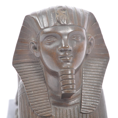 183 - An Egyptian Revival late Victorian early 20th century circa 1900 cast bronze figure of Sphinx. The f... 