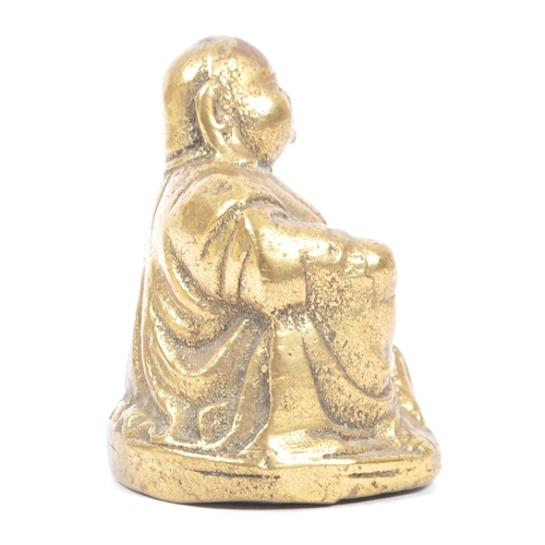 186 - A Chinese Oriental early 20th century cast brass Laughing Buddha / Budai sculpture figurine. The fig... 