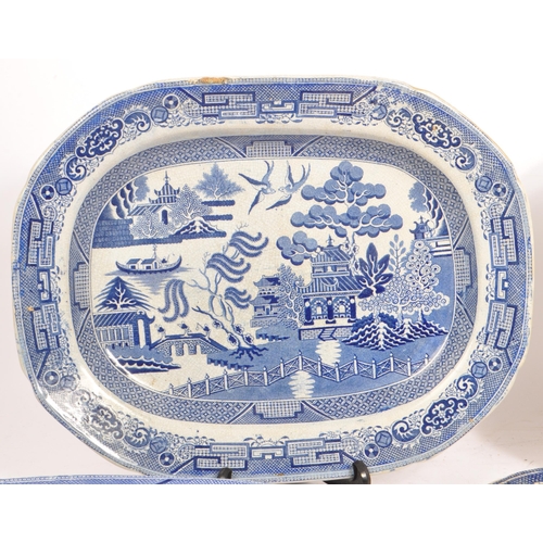 19 - A collection of 19th century stone china Staffordshire blue and white plates / platters. Having 9 pl... 