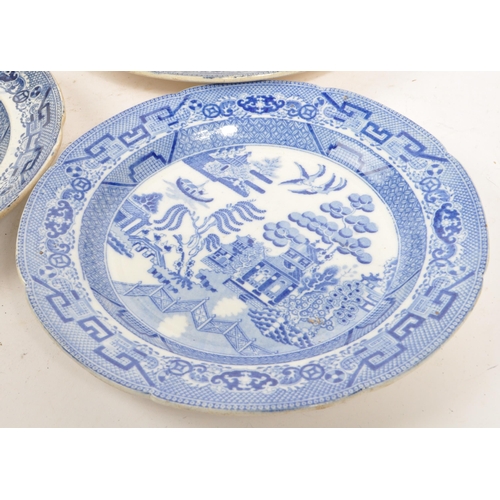 19 - A collection of 19th century stone china Staffordshire blue and white plates / platters. Having 9 pl... 