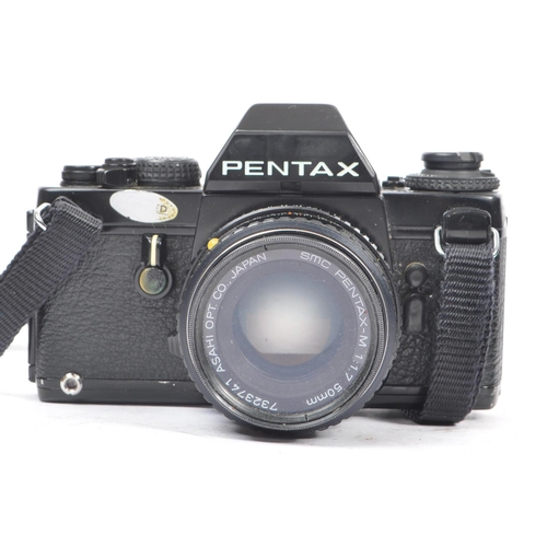 190 - Pentax - Two late 20th century Pentax 35mm SLR film cameras alongside a collection of lenses and acc... 