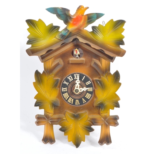 194 - Three mid 20th century carved wood cuckoo clocks, possibly of Black Forest German origin. The clocks... 