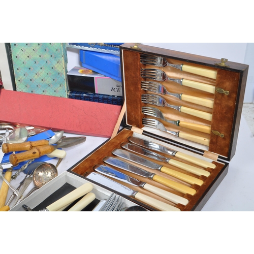 195 - A large collection of 20th century silver plate and stainless steel cutlery. The collection to inclu... 