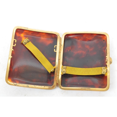 201 - A pair of early 20th century circa 1920s tortoise shell cigarette cases / trinket box. The lot to in... 