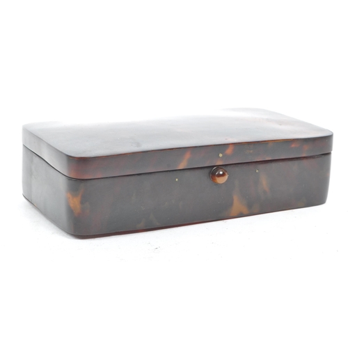 201 - A pair of early 20th century circa 1920s tortoise shell cigarette cases / trinket box. The lot to in... 