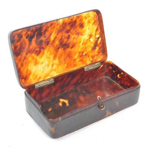 201 - A pair of early 20th century circa 1920s tortoise shell cigarette cases / trinket box. The lot to in... 