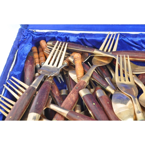 203 - A collection of Mid 20th Century 92 piece Danish style serving cutlery / flatware in original mahoga... 