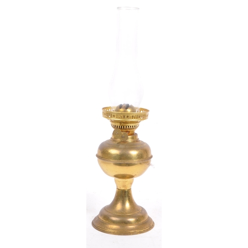 223 - A 19th century Victorian brass and glass oil lamp by Dilex, England. Having a clear glass flute with... 