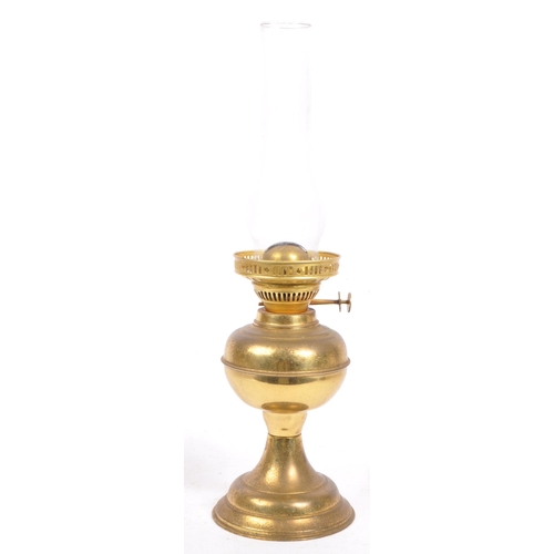 223 - A 19th century Victorian brass and glass oil lamp by Dilex, England. Having a clear glass flute with... 