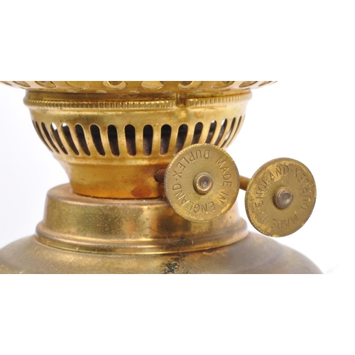 223 - A 19th century Victorian brass and glass oil lamp by Dilex, England. Having a clear glass flute with... 