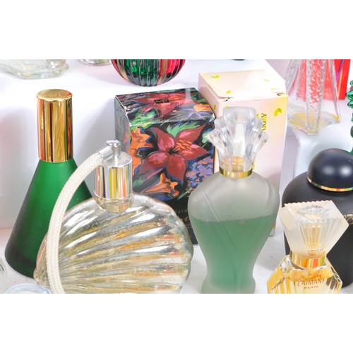 224 - A collection of 20th century ladies scent perfume toilettes and bottles to include; Opium, Fendi, Ca... 