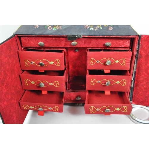 226 - A 1920s Chinese embroidered twin swing door sewing box. Having independant lidded box atop, embroide... 