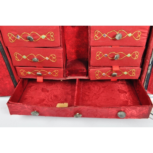 226 - A 1920s Chinese embroidered twin swing door sewing box. Having independant lidded box atop, embroide... 