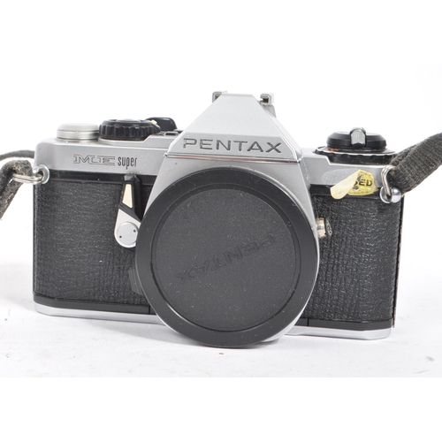 228 - A 20th century circa. 1980s boxed Pentax ME Super 35mm SLR camera alongside a collection of Pentax K... 