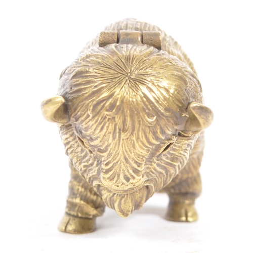 229 - A vintage 20th century brass vesta case in the form of Bison / Buffalo. In a standing position with ... 