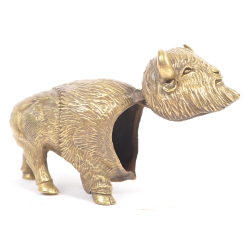 229 - A vintage 20th century brass vesta case in the form of Bison / Buffalo. In a standing position with ... 