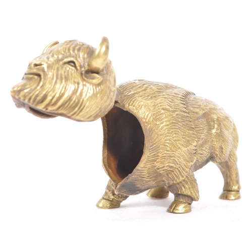 229 - A vintage 20th century brass vesta case in the form of Bison / Buffalo. In a standing position with ... 