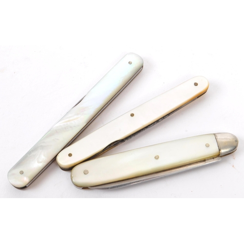 231 - A collection of seven 19th & 20th century mother of pearl handled stainless steel fruit knives. Some... 