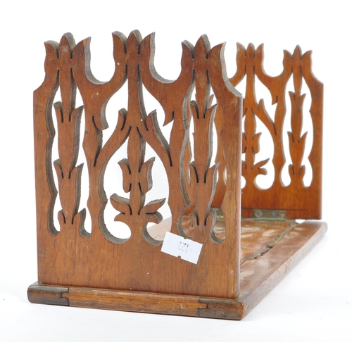 236 - A mid century mahogany folding / metamorphic book stand, with carved folding ends with brass hinges.... 