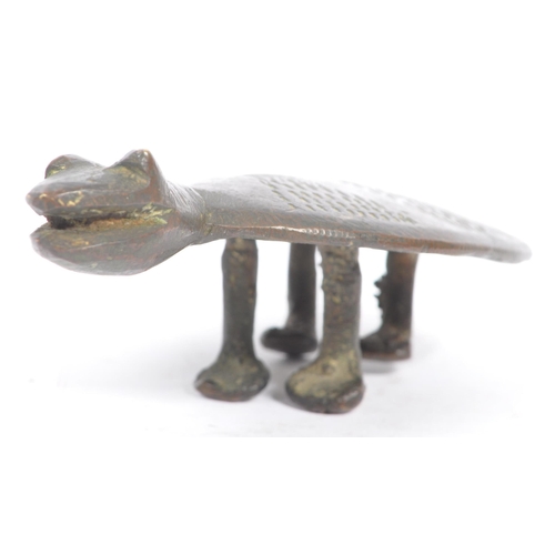 251 - A 20th century Asian bronze turtle figure. The figure raised on four legs, with engraved decoration ... 