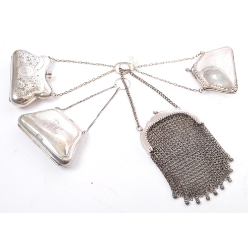 252 - A collection of four early to mid 20th century silver plate ring and chainmail purses. The lot to in... 