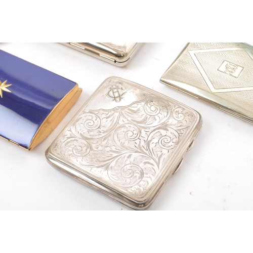 255 - A collection of seven early to mid 20th century silver plated & brass cigarette cases. To include an... 