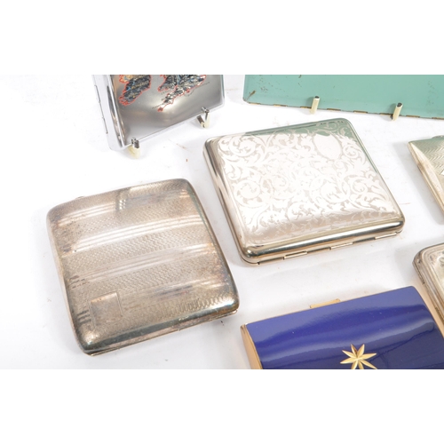 255 - A collection of seven early to mid 20th century silver plated & brass cigarette cases. To include an... 