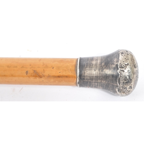 262 - A 20th century hallmarked silver topped walking stick cane. The cane having a bulbous rounded hammer... 