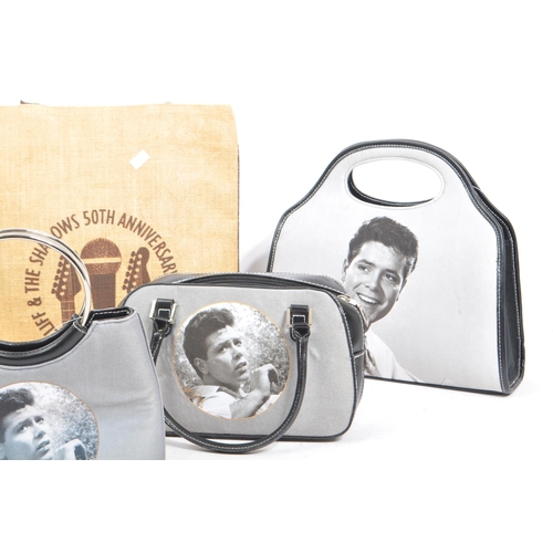 268 - Sir Cliff Richard - A collection of contemporary hand bags and purse / wallet. In the black and whit... 