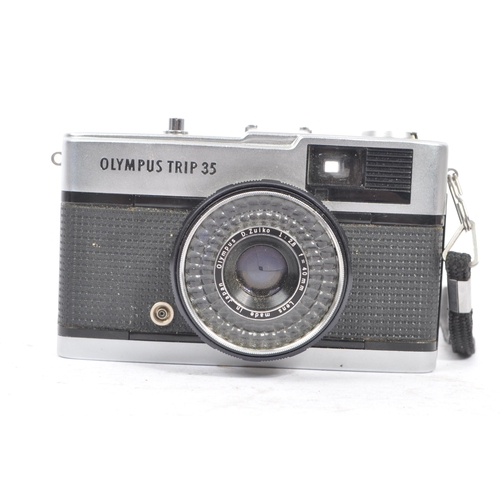 270 - Olympus Trip - Two mid 20th century Olympus Trip 35 35mm viewfinder cameras. One camera circa 1960s,... 