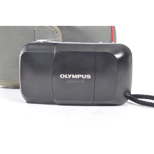 279 - Olympus Mju - Two late 20th century Olympus Mju 1 35mm compact point and shoot cameras. Each in the ... 