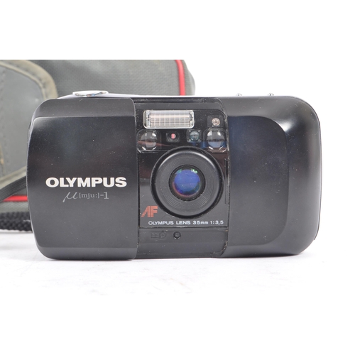 279 - Olympus Mju - Two late 20th century Olympus Mju 1 35mm compact point and shoot cameras. Each in the ... 