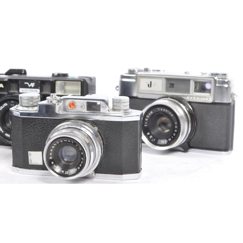 281 - A large collection of 20th century 35mm rangefinder / viewfinder film cameras. The lot to included a... 