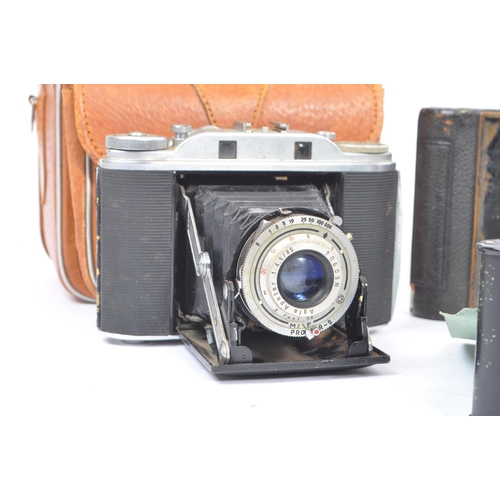 282 - A collection of early and mid 20th century film folding cameras. The collection to include a circa 1... 