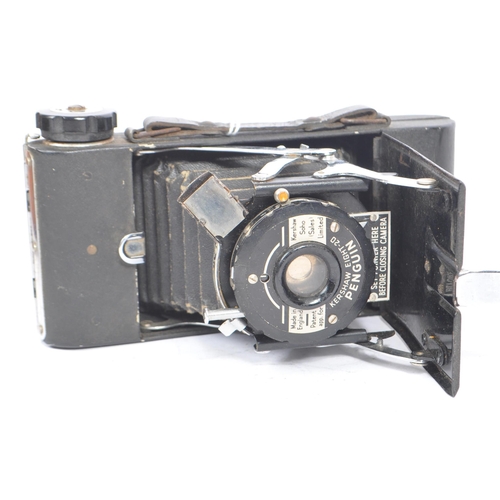 282 - A collection of early and mid 20th century film folding cameras. The collection to include a circa 1... 