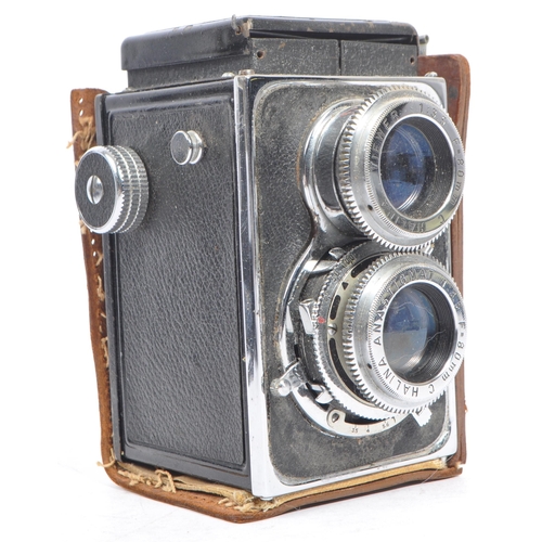 284 - Two mid 20th century TLR medium format film cameras. The collection to include a Halina Flex A1 came... 