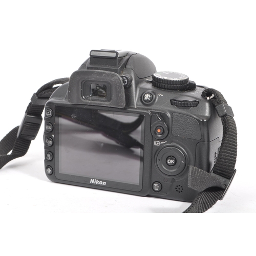 285 - Nikon - A contemporary circa 2010/11 Nikon D3100 digital SLR camera body. The camera in manufacturer... 