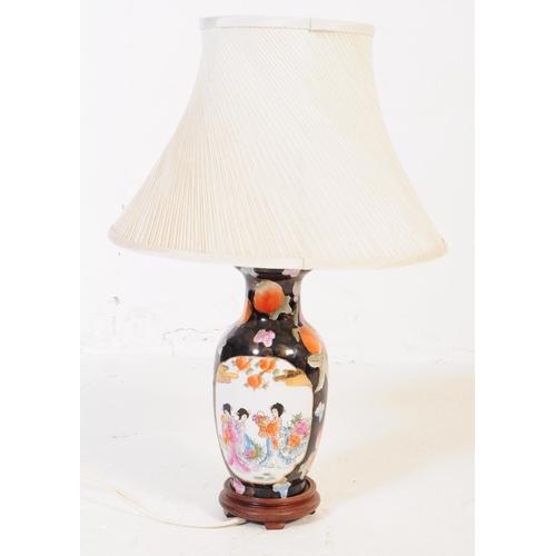 291 - A pair of 20th century Japanese satsuma vase lamps. The lamps having decoration in the form of flora... 