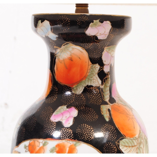 291 - A pair of 20th century Japanese satsuma vase lamps. The lamps having decoration in the form of flora... 