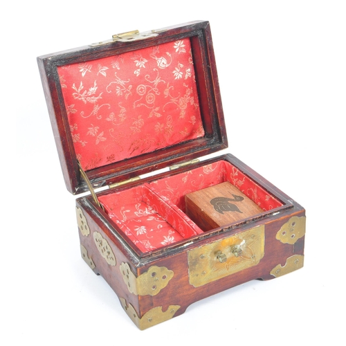 298 - A collection of 20th century Chinese Asian decorative boxes and pieces. The collection to include a ... 