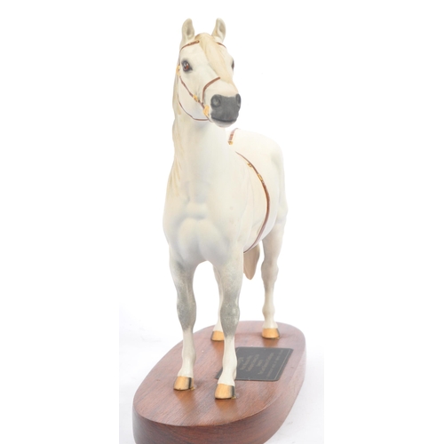 3 - Beswick - A porcelain china figurine of a horse titled champion. Welsh mountain pony Gredington Simw... 