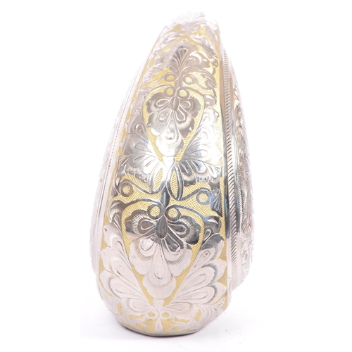 306 - A large contemporary aluminium teardrop shaped decoration / urn. The ornament in the shape of a tear... 