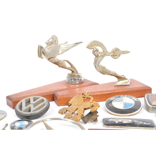 313 - Two mid 20th century vintage stainless steel car mascots. One being a prancing outstretched winged h... 