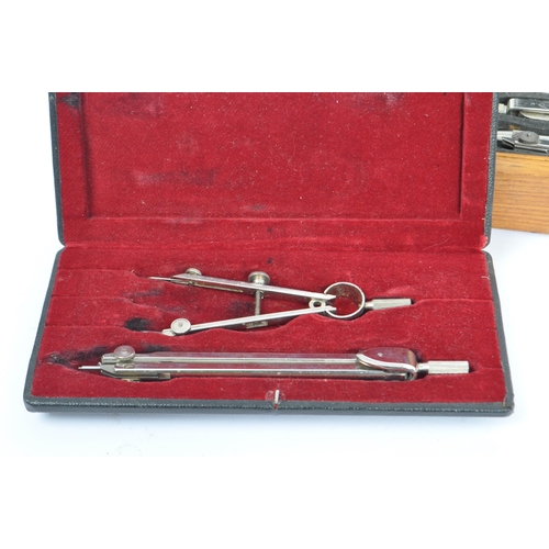 317 - A collection of draftsman's / engineers workman tools / instruments and measuring items. Comprising ... 