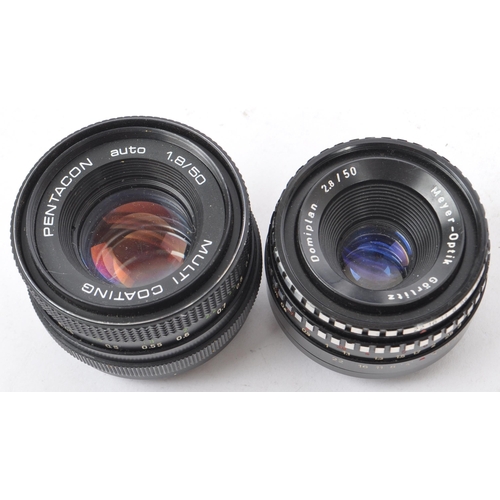 323 - A collection of 20th century M42 mount 35mm lenses for use with Praktica, Pentax, and Fujica. The co... 