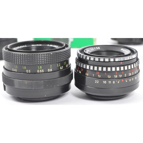 323 - A collection of 20th century M42 mount 35mm lenses for use with Praktica, Pentax, and Fujica. The co... 