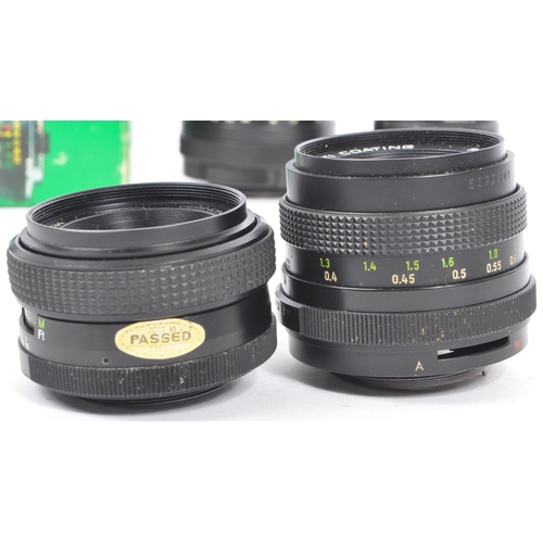 323 - A collection of 20th century M42 mount 35mm lenses for use with Praktica, Pentax, and Fujica. The co... 