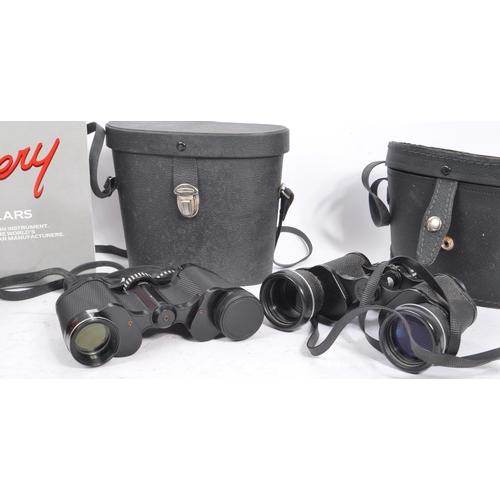 334 - A collection of vintage 20th century binoculars. Three in total with some cased, together with a Hal... 